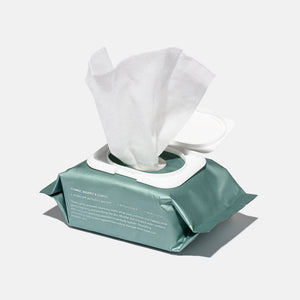 Hydroactive Cleanse Cloths - 30 Pack | HydroPeptide in green resealable packaging with one white cleansing cloth partially pulled out, ideal for skincare and cleansing routines.