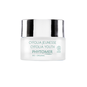Jar of Cyfolia Youth Glow Renewing Wrinkle Cream | Phytomer in frosted glass with silver lid, featuring organic skincare designed for youthful skin glow.