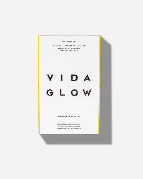 Box of Natural Marine Collagen | VIDA GLOW powder supplement with pineapple flavor, promoting glowing skin and smoothing fine lines, displayed on a white background with shadow.