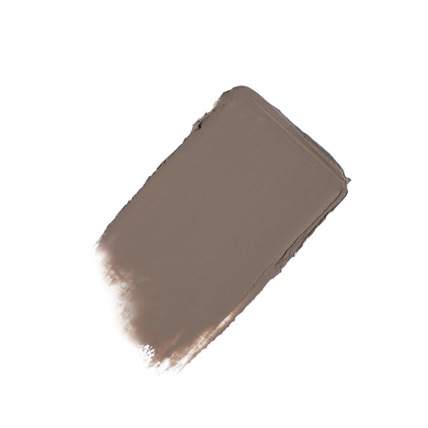 Smudge of gray taupe color makeup representing the shade of ColorLuxe Eye Shadow Stick | Jane Iredale for smooth, blendable eye color.
