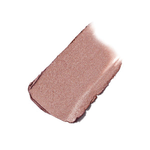 Close-up of a smooth, shimmery rose-colored eyeshadow swatch showcasing the texture and finish of the ColorLuxe Eye Shadow Stick | Jane Iredale.