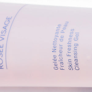 Close-up of a skincare product label showing Rosée Visage Skin Freshness Cleansing Gel | Phytomer in soft pastel colors promoting gentle cleansing and skin freshness.