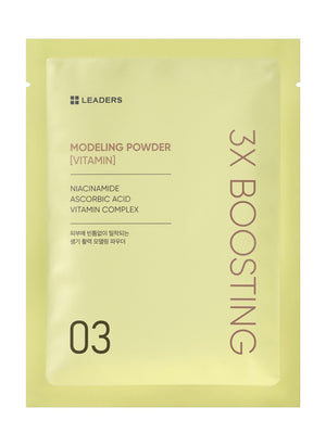 Front view of a pale yellow packet featuring 3X Boosting Modeling Mask - Vitamin | Leaders with key ingredients niacinamide, ascorbic acid, and vitamin complex for skincare.