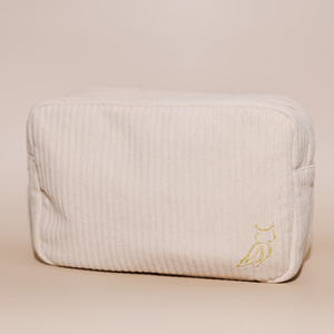 Soft beige corduroy Luxe Travel Bag | Lucky Owl with subtle owl embroidery on the corner, designed for stylish and practical travel organization.