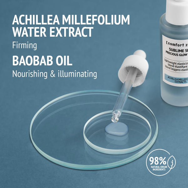 Close-up of a dropper dispensing translucent liquid onto glass petri dishes, highlighting Achillea Millefolium Water Extract for firming and Baobab Oil for nourishing and illuminating in Sublime Skin Precious Glow Drops | [ comfort zone ].