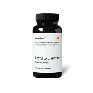 Black bottle of Acetyl L-Carnitine dietary supplement capsules promoting cognitive function and energy support for wellness supplements.