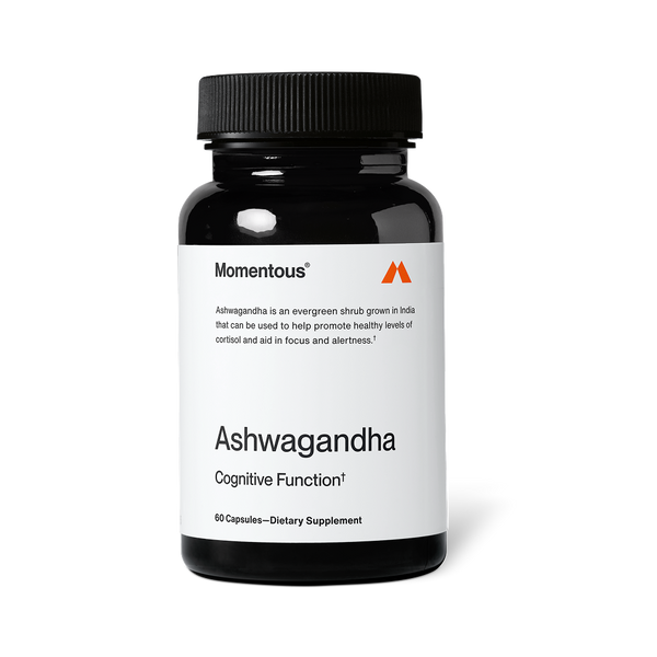 Bottle of Ashwagandha dietary supplement by Momentous, designed to support cognitive function and promote healthy cortisol levels for wellness and focus.