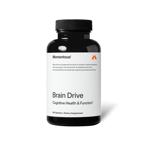 Bottle of Brain Drive dietary supplement by Momentous for cognitive health and function with 60 capsules in black container and minimalist white label design.