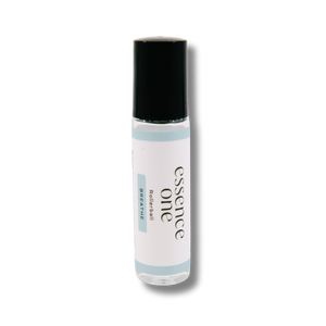 Small clear rollerball bottle with a black cap labeled Essence One Breathe Rollerball, designed for respiratory support wellness supplements.