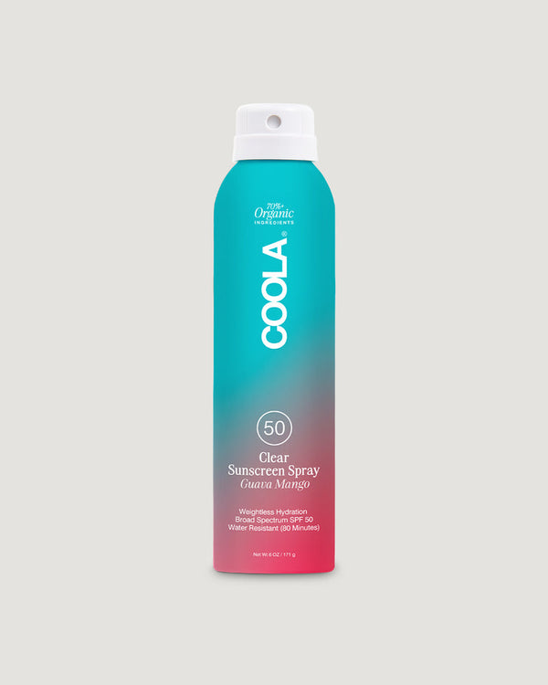Bottle of Classic Body Organic Sunscreen Spray SPF 50 - 6 fl oz | COOLA with a turquoise to pink gradient design, promoting skincare and sun protection.