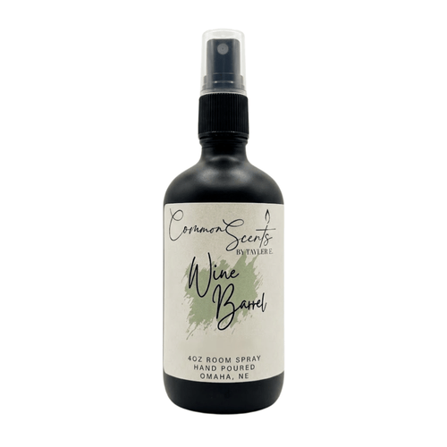 4oz Luxury Room Spray | CommonScents by Tayler E featuring a sleek black bottle with a spray nozzle and a minimalist label for a sophisticated wine barrel scent.