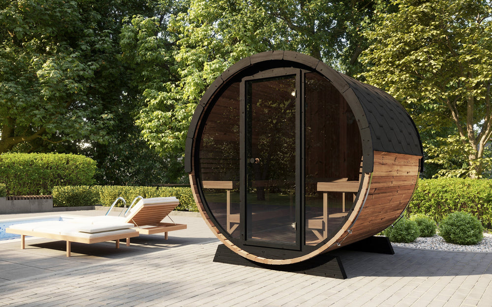 EE8G Sauna Barrel - 6-8 Person | Western Sol, a wooden barrel-shaped sauna with tinted glass door and black shingle roof designed for outdoor wellness and body care relaxation.