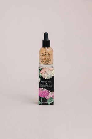 Peptide Glow Serum | French Girl in a clear dropper bottle with a floral-decorated box, designed for skincare and enhancing natural radiance.