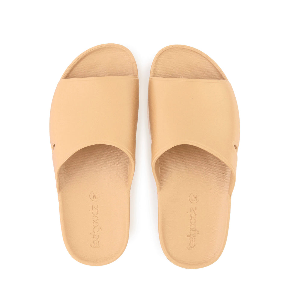 Pair of tan open-toe casual slides with a smooth finish and comfortable sole, designed for easy wear and relaxation in Bonsai Slides Tan | Feelgoodz style.