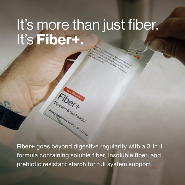 Hands holding a single serving pack of Fiber+ 10-Travel Packs dietary supplement for digestive and gut health with text highlighting its 3-in-1 fiber formula for full system support.