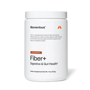 Container of Fiber+ dietary supplement in pure cinnamon flavor by Momentous, promoting digestive and gut health with a comprehensive fiber and starch formula.