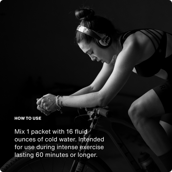 Black and white image of a focused woman wearing headphones and cycling, alongside instructions for Fuel 10-Travel Packs to mix one packet with 16 ounces of cold water for use during intense exercise lasting 60 minutes or longer.