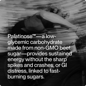 Black and white image of a cyclist in motion with overlay text describing Palatinose as a low-glycemic carbohydrate from non-GMO beet sugar providing sustained energy, included with Fuel 10-Travel Packs.