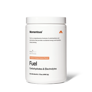 White container of Fuel drink mix with passion orange guava flavor, labeled for carbohydrates and electrolytes to support sustained energy and hydration during training