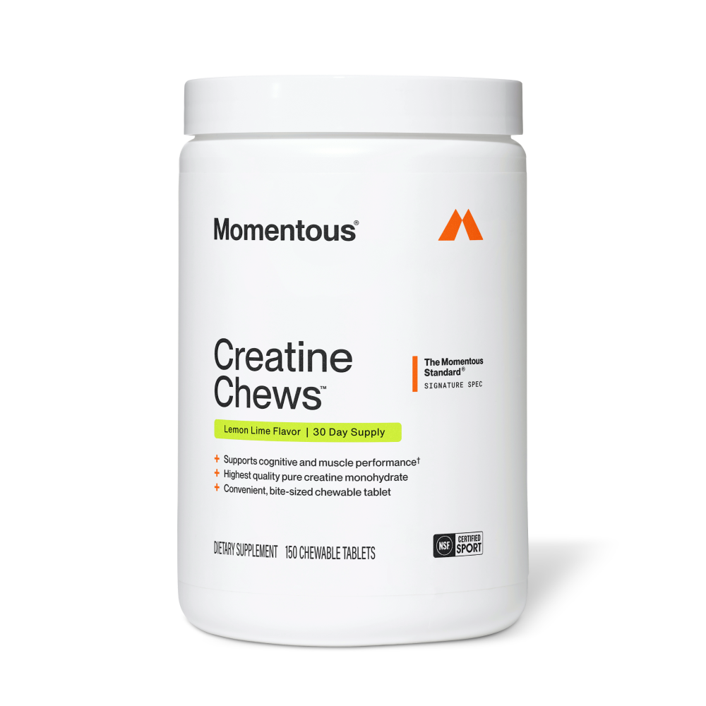 White container of Creatine Chews 150-Count dietary supplement by Momentous, featuring lemon lime flavor and highlighting cognitive and muscle performance support, placed on a white background.