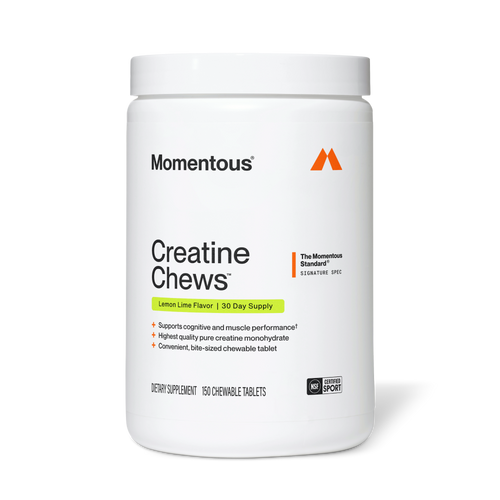 White container of Creatine Chews 150-Count dietary supplement by Momentous, featuring lemon lime flavor and highlighting cognitive and muscle performance support, placed on a white background.