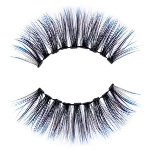 Close-up of a pair of dramatic false eyelashes with subtle colored accents, designed for enhancing eye makeup, labeled Stormy Lash - Colored | Moxielash.