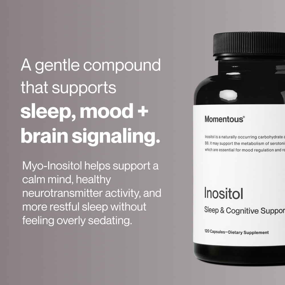 A black bottle of Inositol dietary supplement by Momentous featuring sleep and cognitive support, designed for wellness and mood regulation.