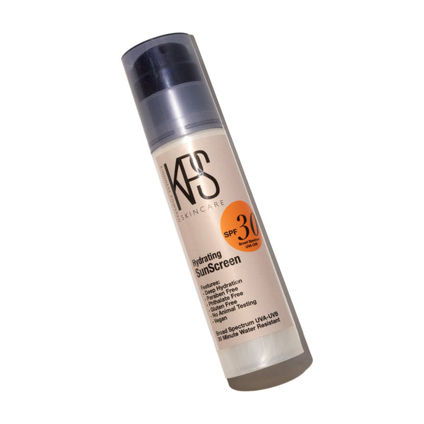 Bottle of KPS Sunscreen - SPF 30 | Kindness Powered Skincare hydrating sunscreen with broad spectrum UVA-UVB protection, cruelty-free and water resistant in a sleek pump container.
