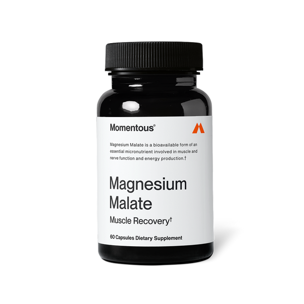 Black bottle of Magnesium Malate dietary supplement capsules designed for muscle recovery and energy, featuring a simple white label with clear text.