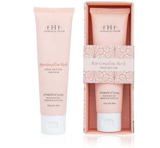 Tube and boxed packaging of Marshmallow Melt Hand Cream | Farmhouse Fresh featuring shea butter for nourishing dry hands and cuticles in soft pink design.