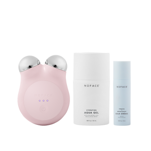 MINI+ Starter Kit | NuFACE featuring a pink handheld microcurrent device with two silver spheres, hydrating aqua gel, and firming brightening silk crème for skincare and wellness.