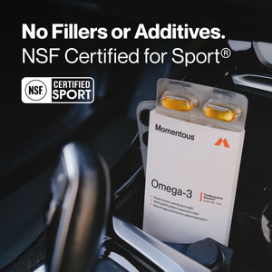Omega-3 Travel Packs displayed in a car cup holder with two softgel capsules visible, highlighting no fillers or additives and NSF Certified for Sport wellness supplements.