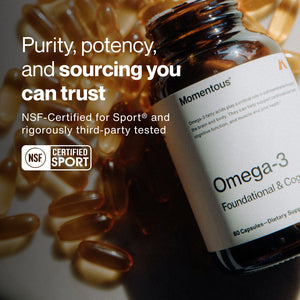 Close-up of a dark amber bottle labeled Omega-3 with softgel capsules scattered around, highlighting purity and potency with NSF Certified Sport and third-party testing for trusted wellness supplements.