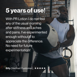 Man in workout attire lifting a medicine ball in a gym with an overlaid testimonial praising PR Lotion® Buy 4, Get 1 Free. $175 Value for relieving stiffness, aches, and pains after five years of use.
