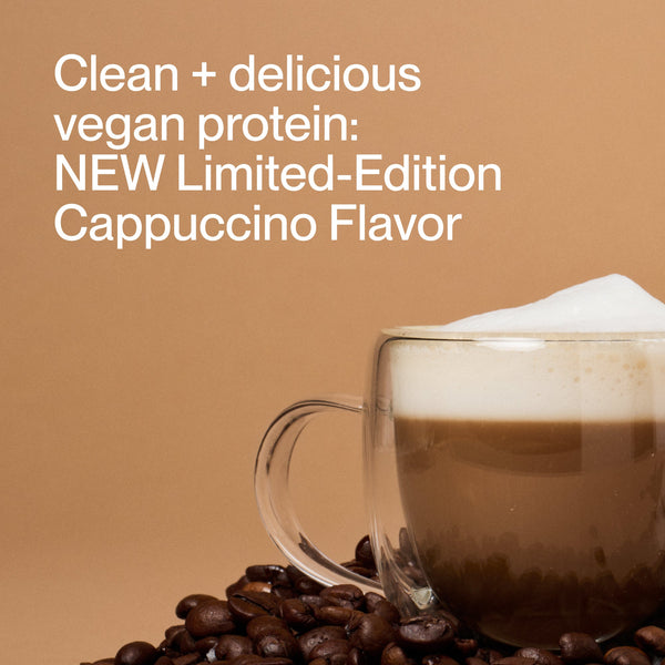 A glass cup of frothy cappuccino surrounded by coffee beans with text promoting the 100% Plant Protein - Flavor Series new limited-edition cappuccino flavor as a clean and delicious vegan protein option.