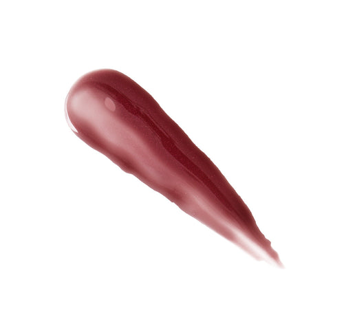 Smooth, glossy swatch of deep berry lip treatment showcasing the rich color and texture of Plump Up Pretty Peptide Lip Treatment | Farmhouse Fresh for skincare and lip care.