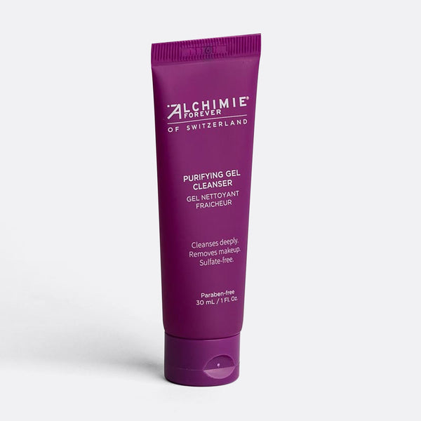 Tube of Purifying Gel Cleanser | Alchimie Forever in deep purple packaging, standing upright with clear white text indicating it cleanses deeply, removes makeup, and is sulfate- and paraben-free.
