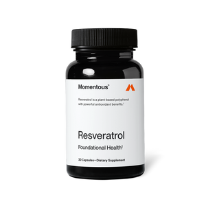 Black bottle of Resveratrol dietary supplement with white label highlighting plant-based polyphenol and antioxidant benefits for foundational health and wellness.