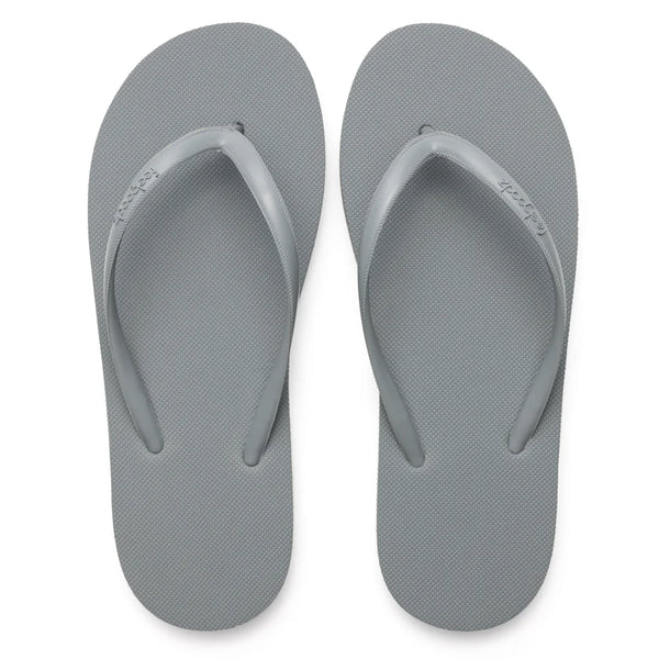 A pair of simple gray flip-flop sandals with textured footbeds featuring the Slimz Core Sandals | Feelgoodz design.