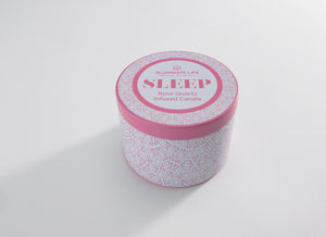 Sleep Candle Tin 6 oz | Aluminate Life in a decorative pink and white tin with rose quartz infusion, promoting relaxation and wellness.