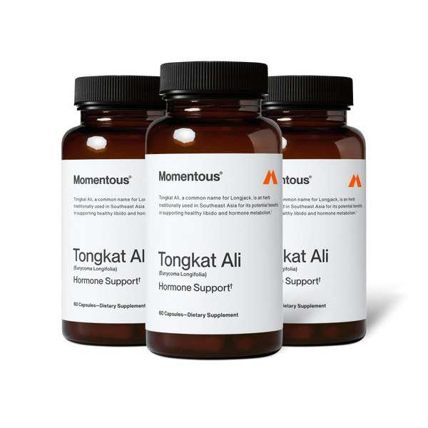 Three amber bottles of Tongkat Ali dietary supplement for hormone support with white labels and black caps, arranged against a white background.