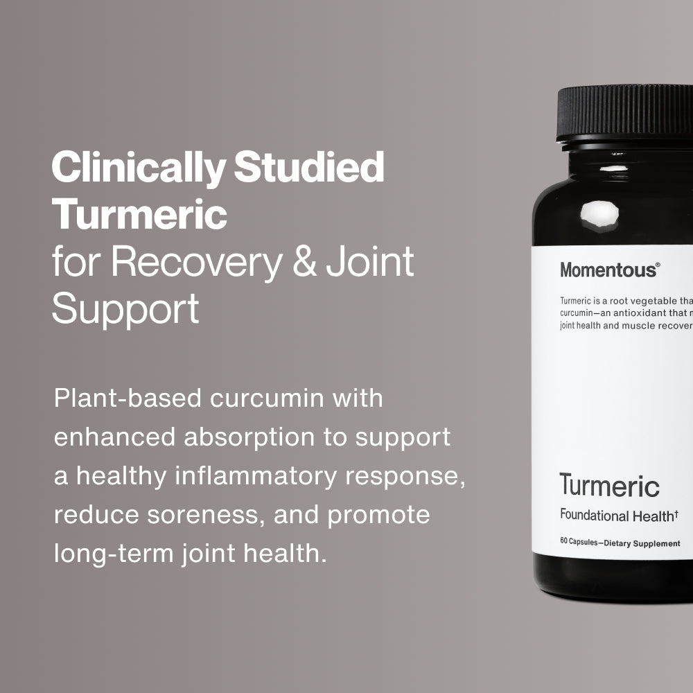 A black bottle of dietary supplement labeled Turmeric by Momentous, promoting joint health and muscle recovery with antioxidant properties.