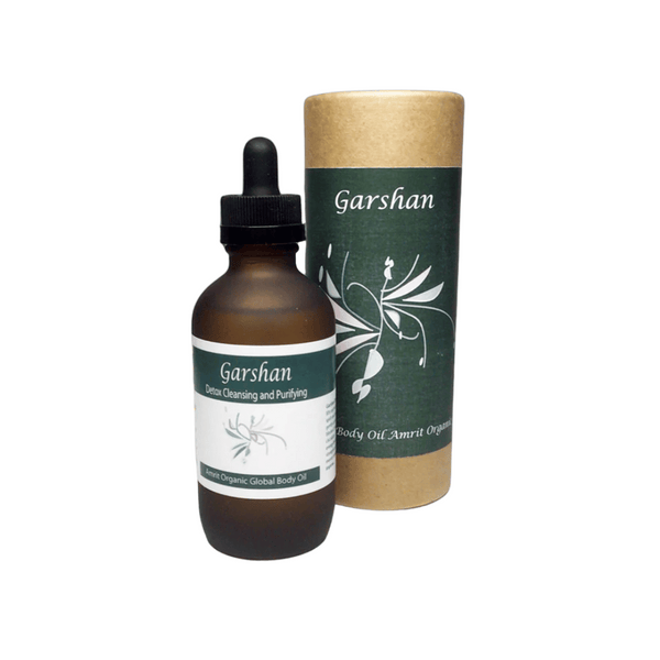 Garshan Body Oil | Red Cherry Group in a dark glass dropper bottle with green and white label alongside its cylindrical eco-friendly packaging, promoting skincare and body care.