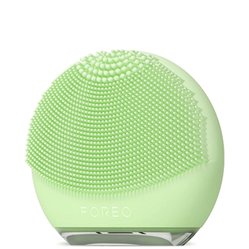 LUNA™ 4 Go | FOREO green silicone facial cleansing brush with textured surface for gentle exfoliation and deep skincare cleansing, perfect for travel and daily wellness routine.