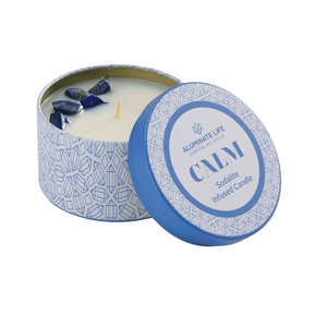 Open blue patterned tin candle labeled Calm Candle Tin 6 oz | Aluminate Life with sodalite crystals embedded in the wax for wellness and relaxation.