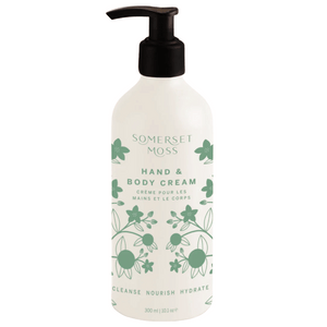 Bottle of Hand & Body Cream | Somerset Moss with green floral design and black pump dispenser, promoting skincare, hydration, and nourishment for hands and body.