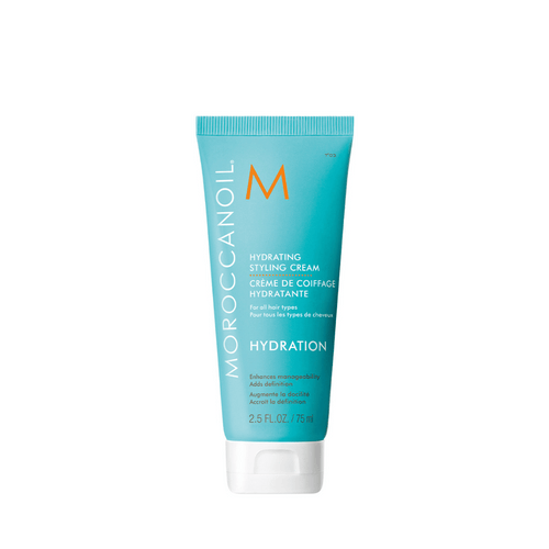 Hydrating Styling Cream | Moroccanoil tube in blue packaging with white cap designed for all hair types, enhancing manageability and adding definition.