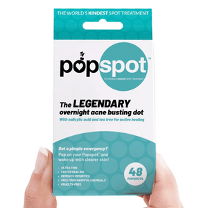 Packaging of Popspot Spot Treatment - Acne & Pimple Remover Dot (48 Pack) | Popmask showing the product as a legendary overnight acne busting dot with salicylic acid and tea tree for healing, held by two hands.