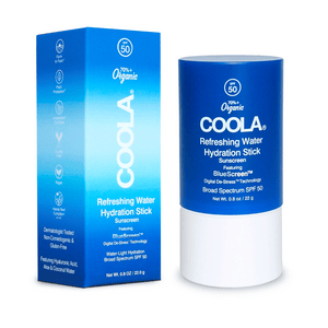 Blue container and packaging of Refreshing Water Stick SPF 50 | COOLA, a skincare sunscreen product with organic ingredients, offering hydration and broad spectrum protection.