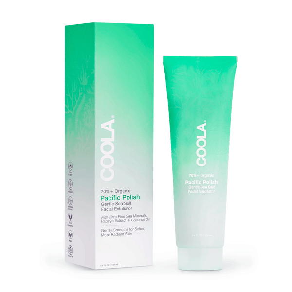 Packaging and tube of Pacific Polish Gentle Sea Salt Facial Exfoliator | COOLA with a green gradient design, highlighting organic ingredients for skincare and radiant skin.